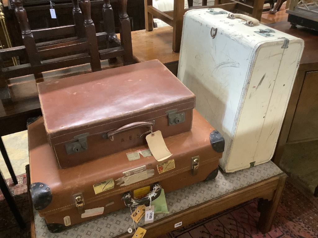 Four assorted vintage suitcases